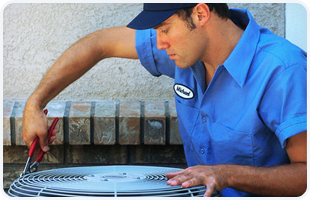 Man repairing the AC unit